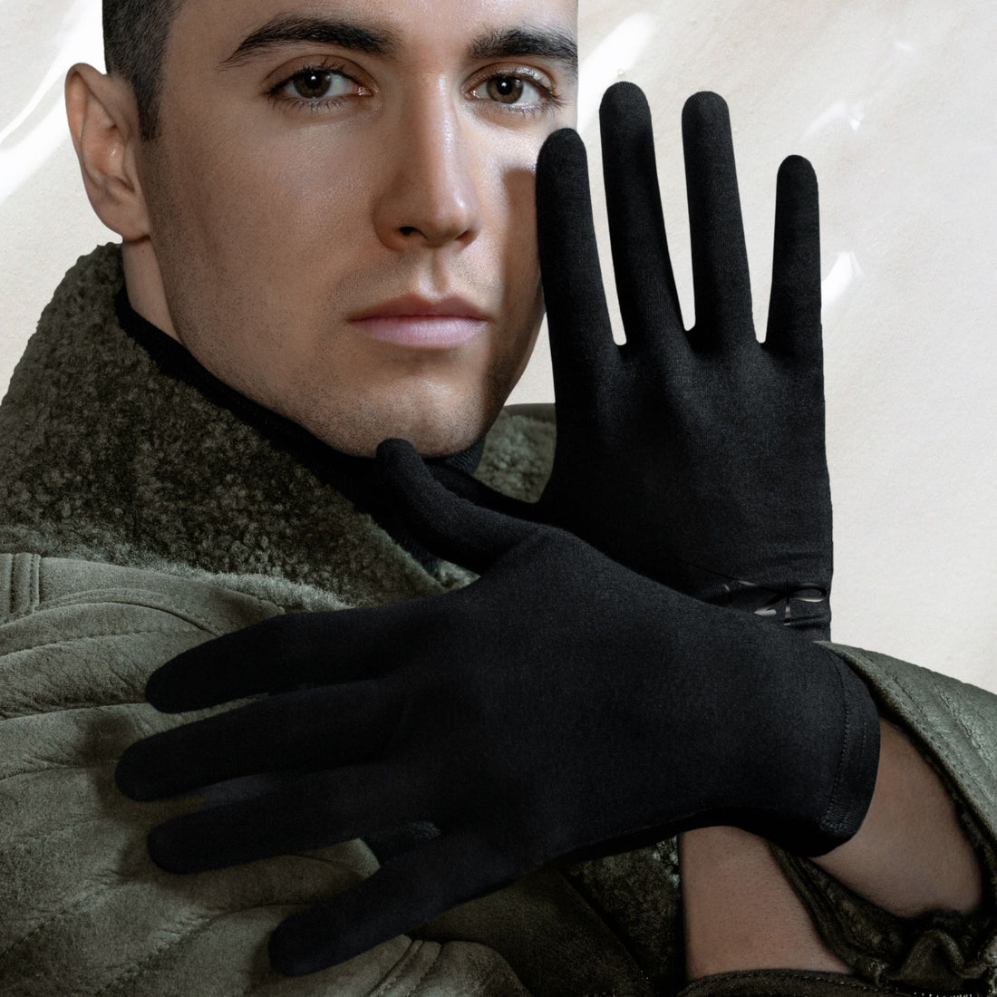 Premium bamboo wellness black gloves for men with sensitive, eczema-prone and dry skin, lightweight, thin, breathable, hypoallergenic, touchscreen, UV protective and thermal hand-care gloves designed for comfort, driving, biking, running, cycling, moisturising rituals and daily wear; soft, silky, second-skin fabric that soothes irritation and supports skin health with elegant, unisex style.